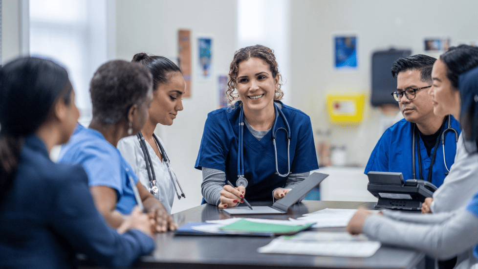 group of registered nurses meeting