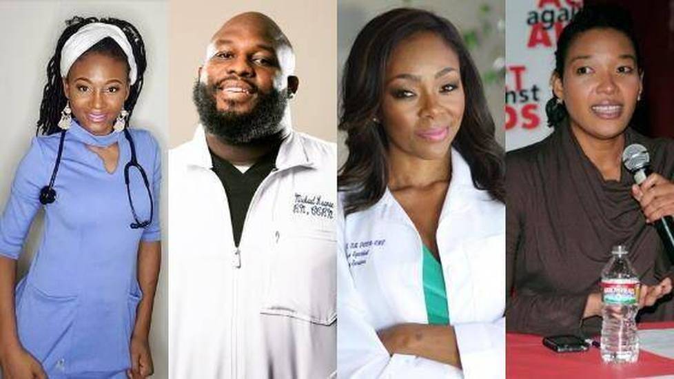 Four black nurses in work attire