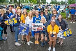 Teamsters Local 2024 nurses rally with signs for fair contracts, safer staffing, and better care.