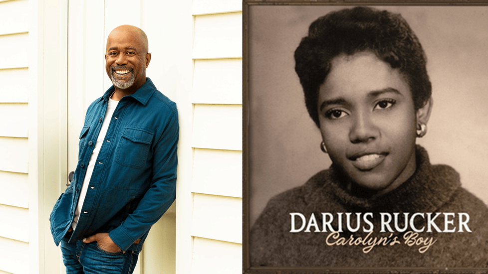 Darius Rucker in a blue jacket stands by a wall; next to him is an album cover for his 'Carolyn's Boy' album with a vintage photo of his mother.