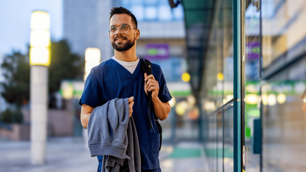 travel nurse walking into hospital