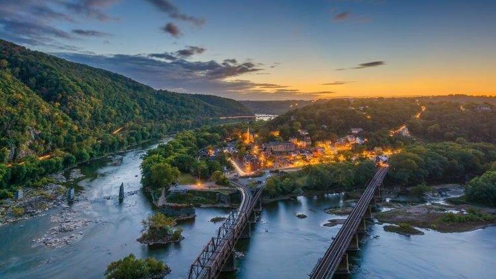 Harpers ferry with train bridges running over the water