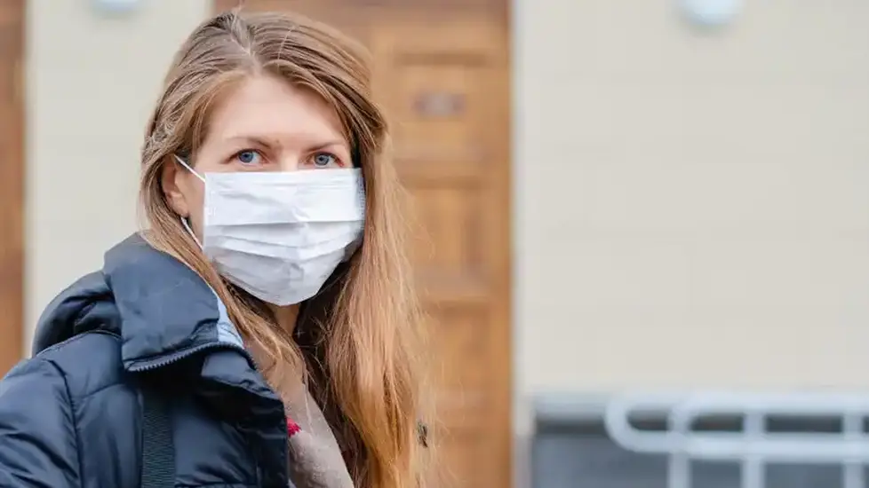 travel nurse in mask