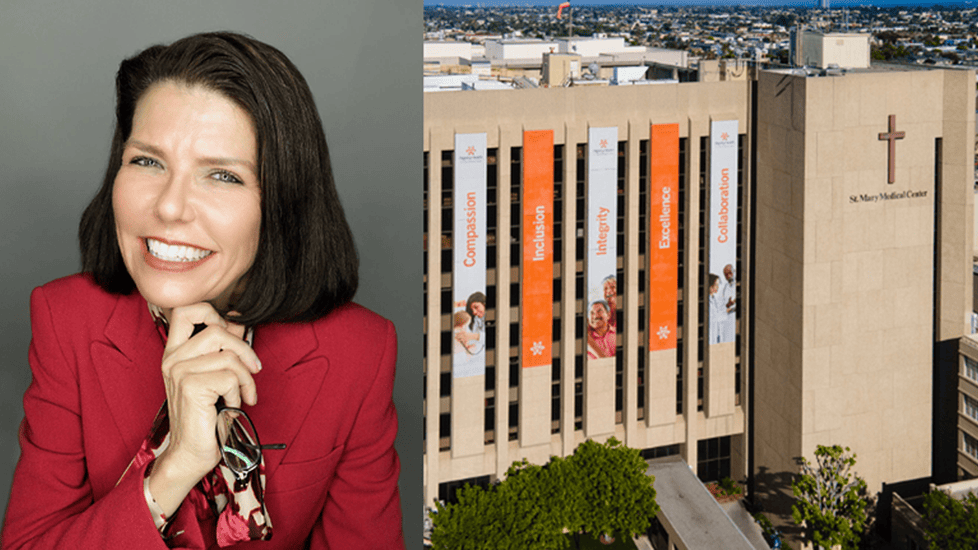 Nancy Valla, former CNO, smiles in a professional headshot; beside her is the exterior of St. Mary Medical Center, with banners displaying the hospital’s core values: 'Compassion' & 'Integrity'