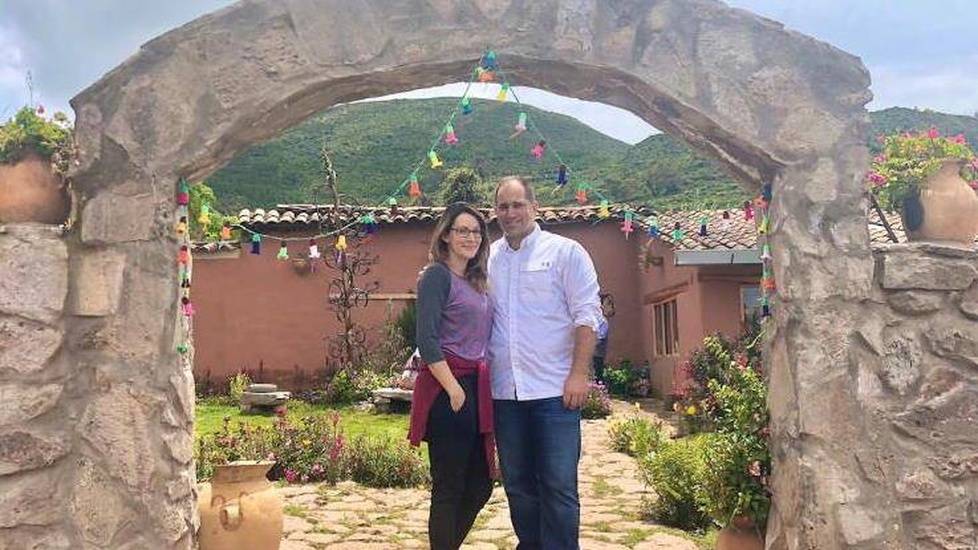 Linda Scruggs and her partner outside in Peru estate