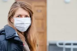 travel nurse in mask