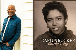 Darius Rucker in a blue jacket stands by a wall; next to him is an album cover for his 'Carolyn's Boy' album with a vintage photo of his mother.