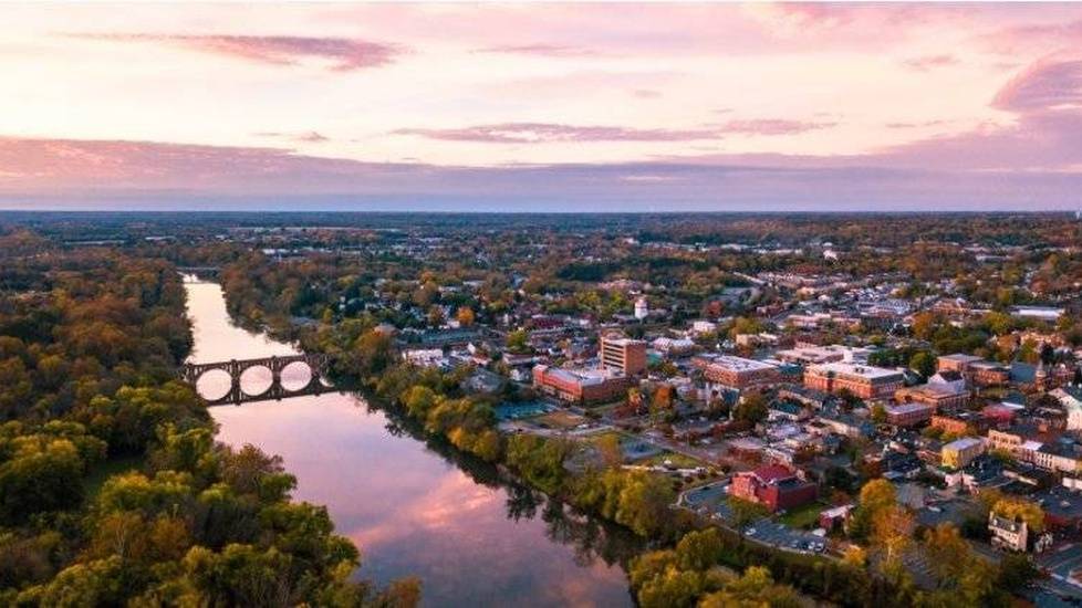 River and bridge crossing into downtown Virginia city